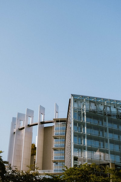 white concrete building under blue sky during daytime